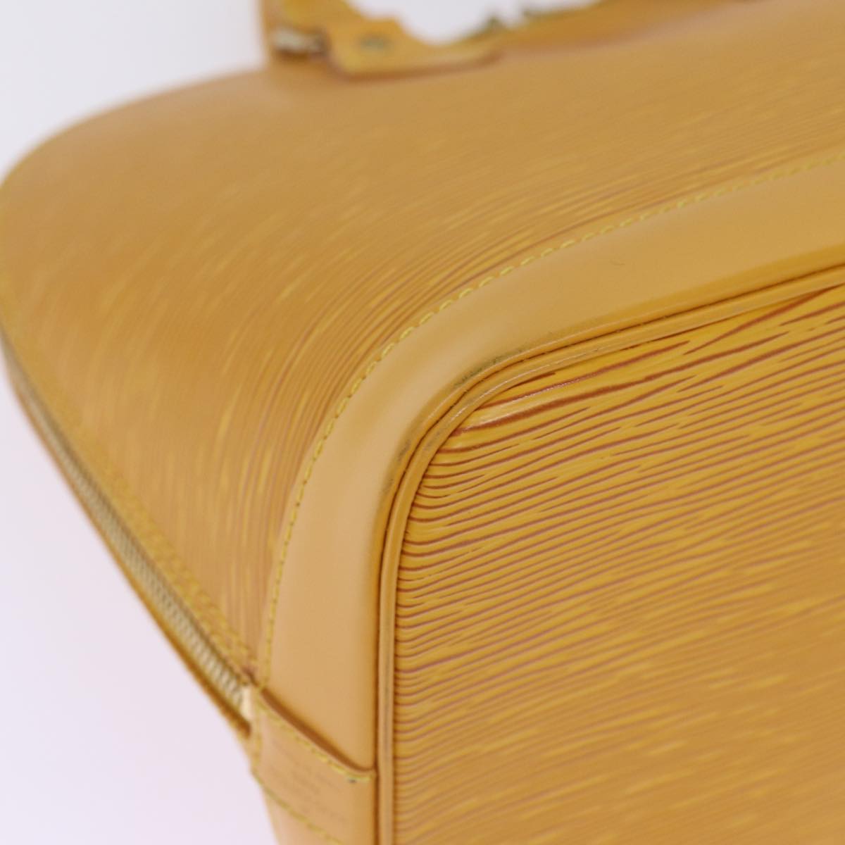 Louis Vuitton Alma Yellow Leather Hand Bag