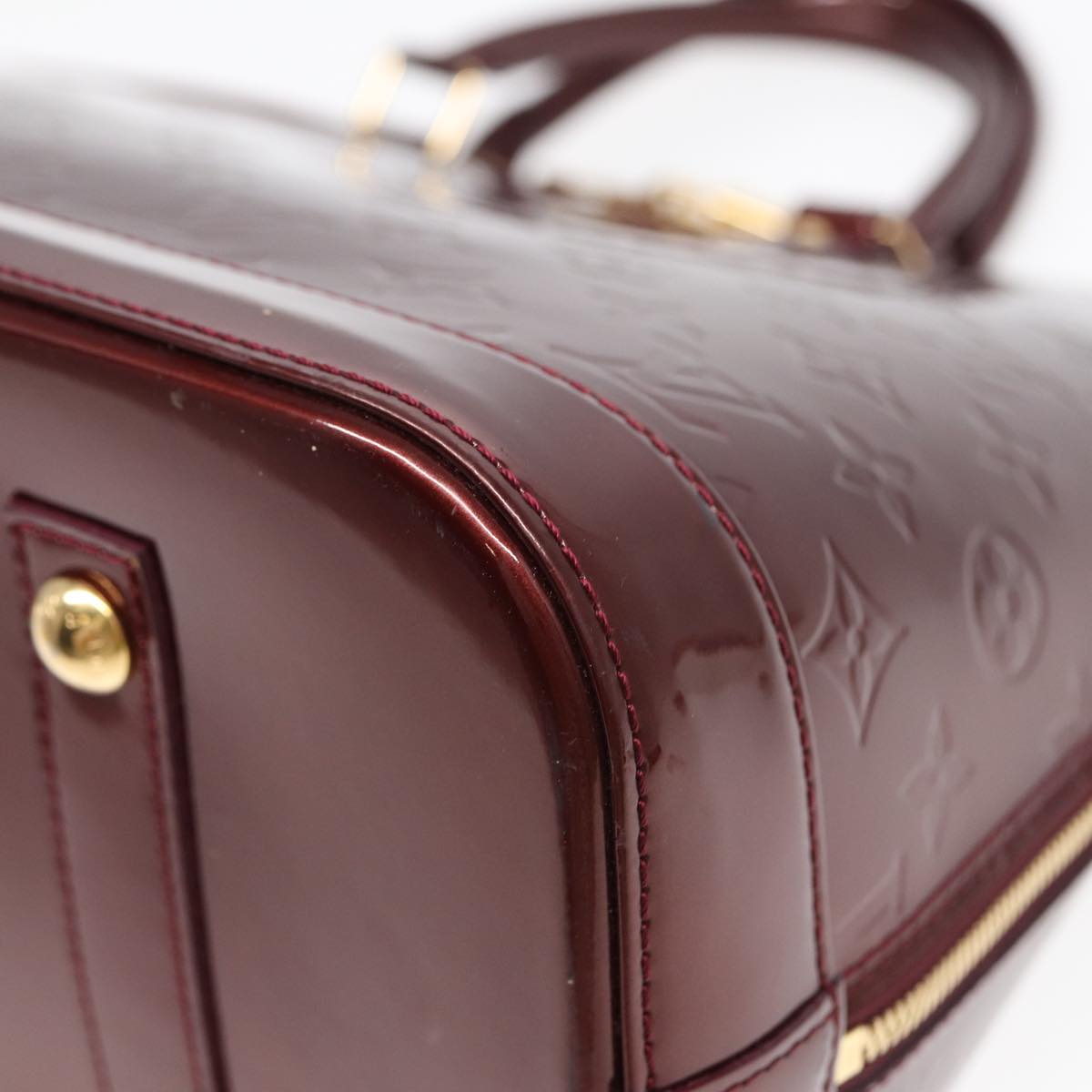 Louis Vuitton Alma Burgundy Patent Leather Hand Bag