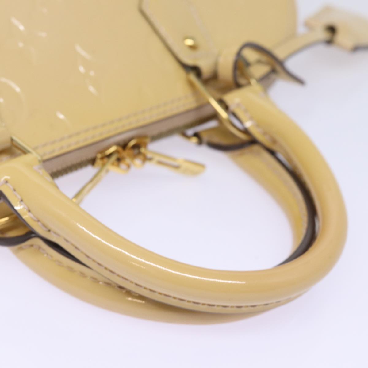 Louis Vuitton Alma Beige Patent Leather Hand Bag