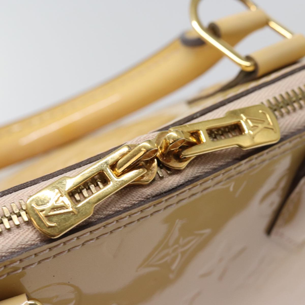 Louis Vuitton Alma Beige Patent Leather Hand Bag