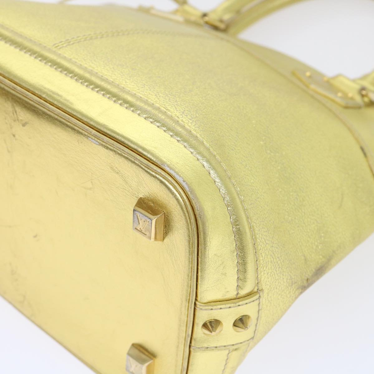 Louis Vuitton Lockit Gold Leather Hand Bag