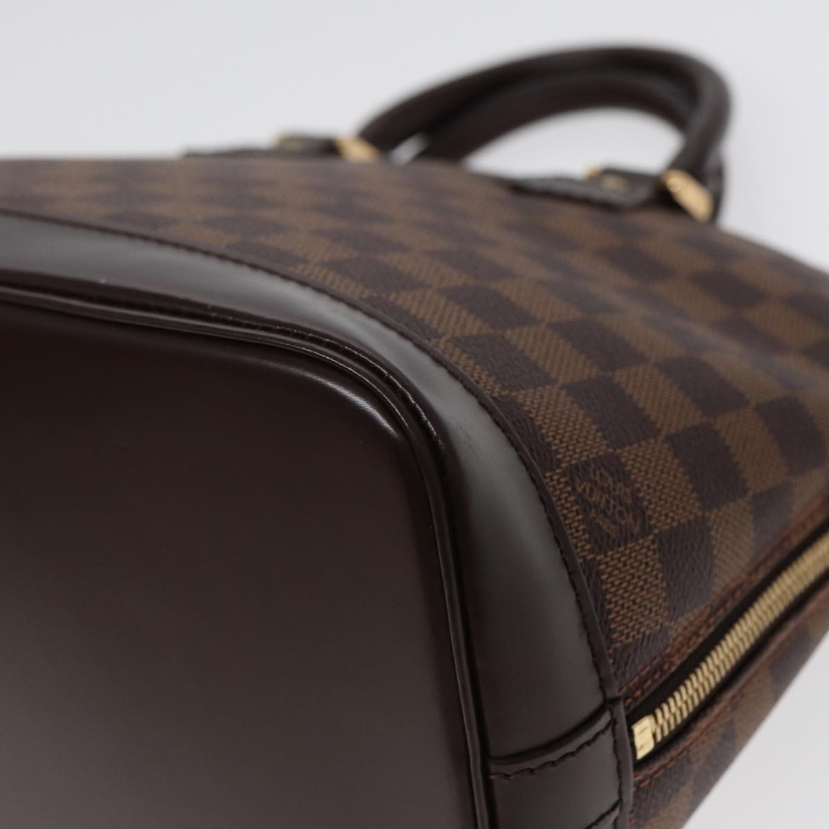 Louis Vuitton Alma Brown Canvas Hand Bag