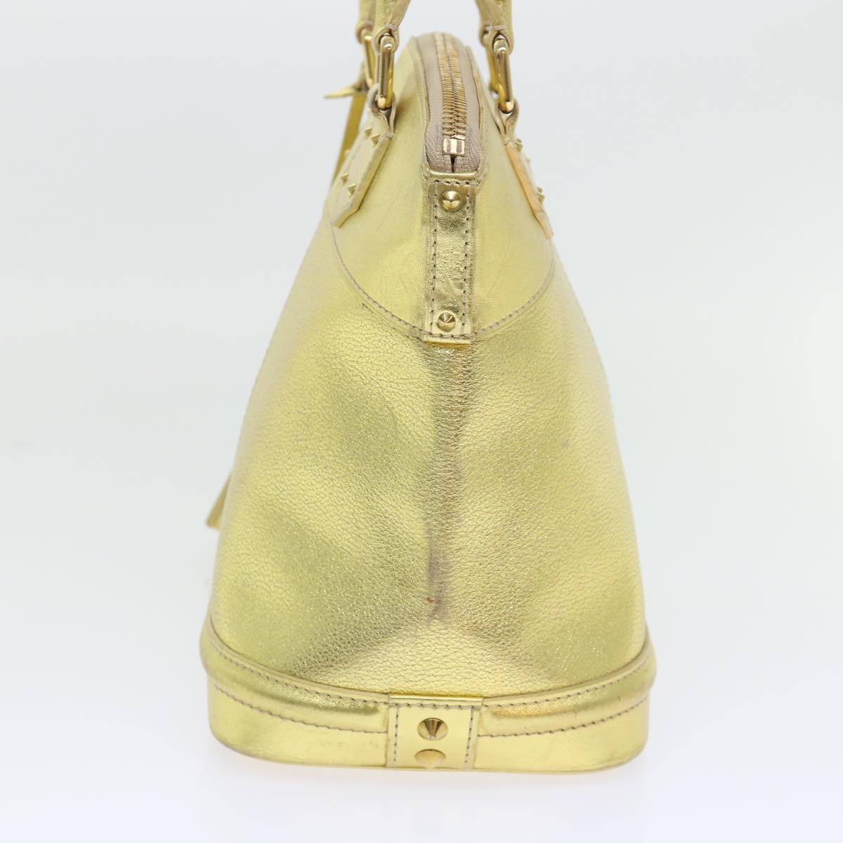 Louis Vuitton Lockit Gold Leather Hand Bag