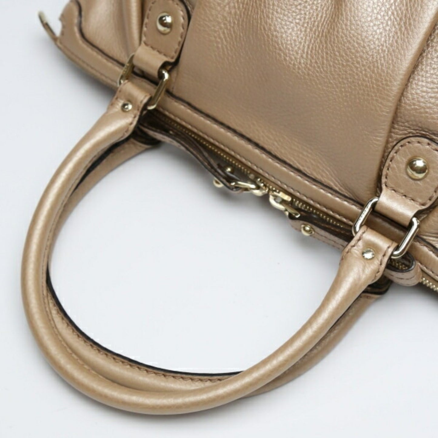 Gucci Sukey Gold Leather Hand Bag